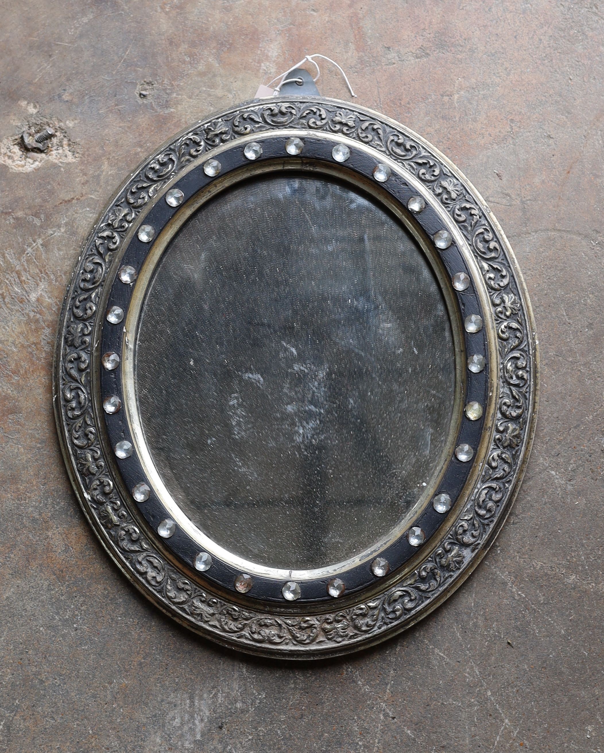 An Irish style oval silvered wall mirror, width 40cm, height 49cm